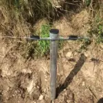 Strainer tube with single line electric fence