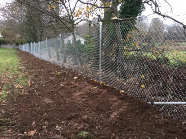 Line of Chainlink wire with clipex fence posts - 6 foot chainlink buried 300mm